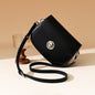 Modern Classic with a Sleek Twist Black Saddle Crossbody Bag
